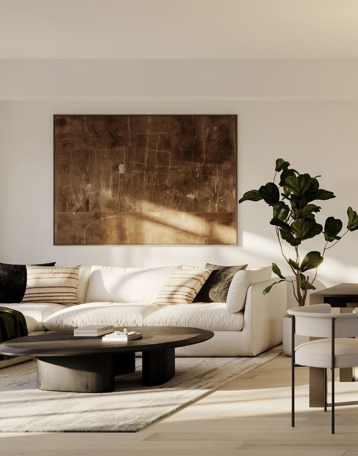 Versant – A modern living room with a white sectional sofa, dark round coffee table, large abstract framed art, and a tall potted fiddle-leaf fig plant.