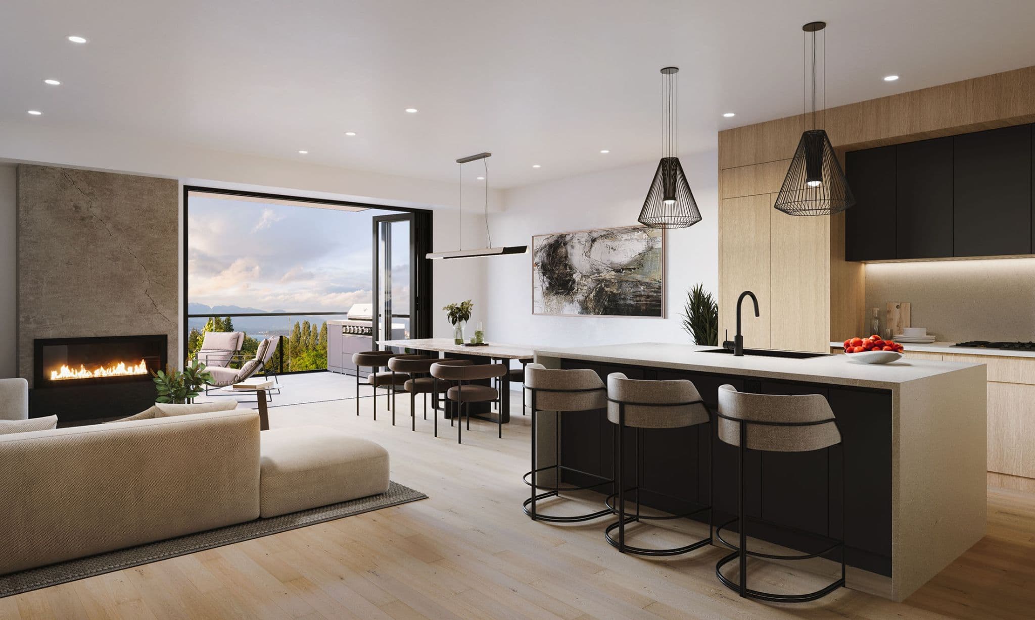 Obsidian on Tenth – A bright, open-concept living, dining, and kitchen area featuring light wood flooring, a built-in fireplace, and a waterfall-edge island with modern barstools. Folding glass doors open onto a spacious balcony with an outdoor grill, framing sweeping views of water and mountains.