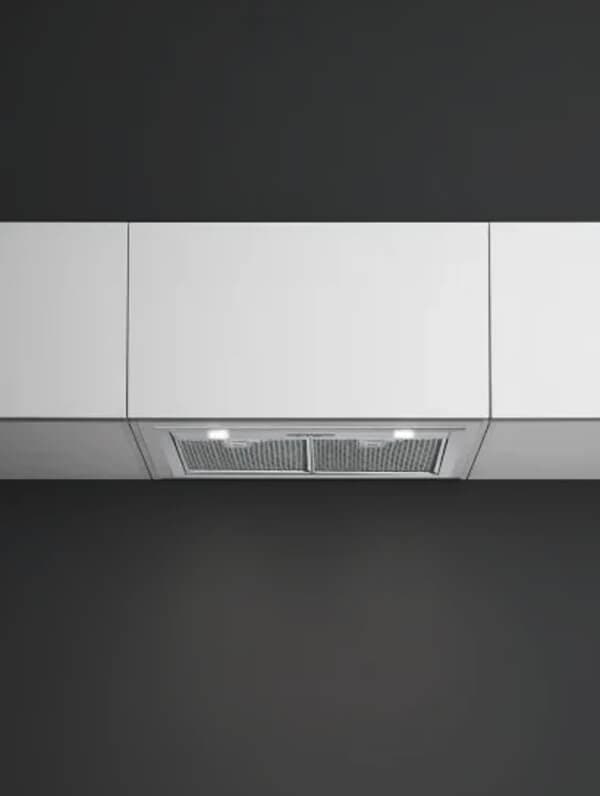 Satori – Product photo of a built-in stainless steel range hood mounted under upper kitchen cabinets.