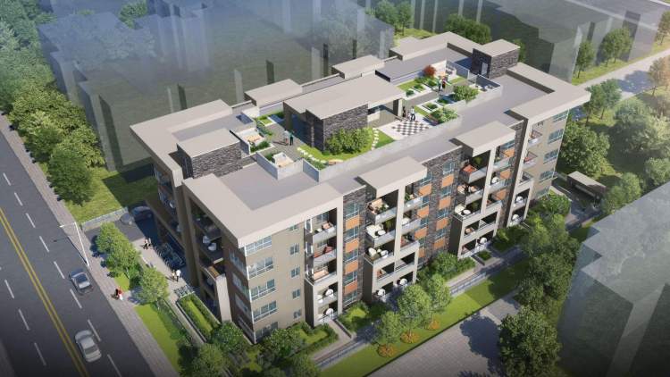 The Ridge – Aerial rendering of a mid-rise condo building showing a rooftop patio with seating, a putting-green style lawn, and landscaped courtyard, surrounded by trees and a street.